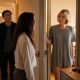 Mara confronts Sloane at a hotel room door; a gold ring sits on a dresser inside.